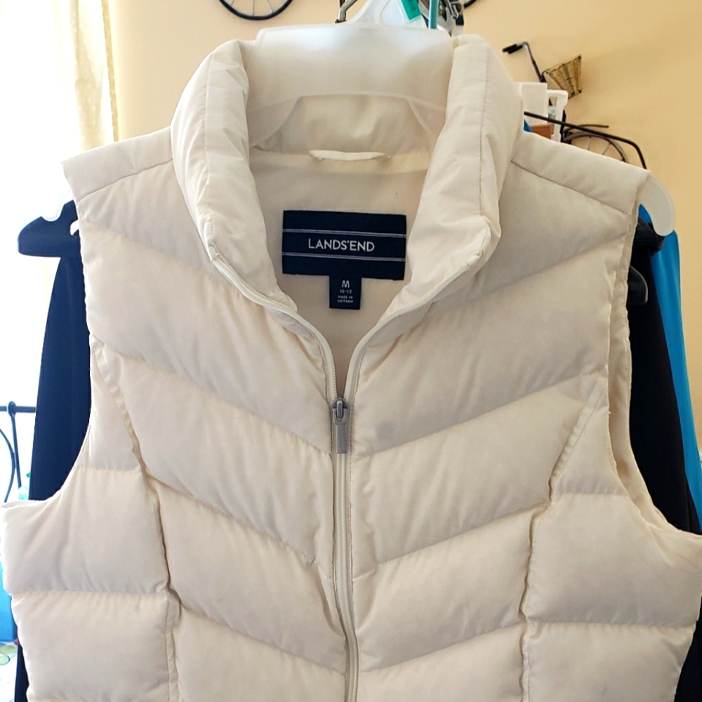 White very gently used puffer vest.
